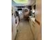 Efficient kitchen features bright countertops and cabinetry and a sunny skylight at 6512 Sw 60Th Ct, Ocala, FL 34474