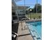 Relaxing screened-in pool provides a perfect outdoor oasis at 6512 Sw 60Th Ct, Ocala, FL 34474