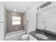 Bathroom features granite counter tops, modern fixtures and a bathtub at 6776 Sw 151St Loop, Ocala, FL 34473