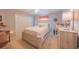 Cozy bedroom featuring neutral decor, carpet, ceiling fan and closet at 9 Fir Trail Pass, Ocala, FL 34472