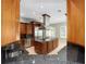 Well-equipped kitchen featuring a large center island, stainless steel appliances, and custom cabinets at 950 Sw 43Rd Pl, Ocala, FL 34471