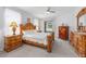 Bedroom featuring ceiling fan, and wood furniture at 9693 Sw 90Th St, Ocala, FL 34481