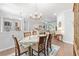 Open-concept dining area connected to the living room, perfect for entertaining at 9693 Sw 90Th St, Ocala, FL 34481