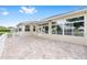 This home's paver patio has a retractable awning, perfect for outdoor living and entertaining at 9693 Sw 90Th St, Ocala, FL 34481