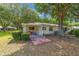 Well-maintained backyard with covered patio at 9726 Sw 94Th Ter # C, Ocala, FL 34481