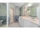 Ensuite bathroom with a shower, toilet, and a vanity at 9726 Sw 94Th Ter # C, Ocala, FL 34481