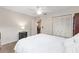 Cozy bedroom with a large closet and a comfortable white bed at 9726 Sw 94Th Ter # C, Ocala, FL 34481