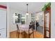 Sunlit dining area with a view and sliding glass doors to the outside at 9726 Sw 94Th Ter # C, Ocala, FL 34481