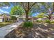 Inviting single-story home with a well-manicured lawn and mature shade trees at 9726 Sw 94Th Ter # C, Ocala, FL 34481