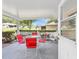 Charming outdoor patio with table and chairs at 9726 Sw 94Th Ter # C, Ocala, FL 34481