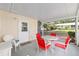 Cozy patio with outdoor seating and peaceful view at 9726 Sw 94Th Ter # C, Ocala, FL 34481