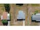 Bird's-eye view of residences showcasing well-manicured lawns and mature landscaping at 10197 Sw 88Th Ter, Ocala, FL 34481