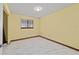 Bedroom with marble tile floors, window, baseboard trim and neutral-colored walls at 10197 Sw 88Th Ter, Ocala, FL 34481
