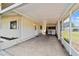 Spacious covered carport featuring an outdoor kitchenette and ample parking space, perfect for entertaining at 10197 Sw 88Th Ter, Ocala, FL 34481