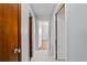 Hallway featuring tile floor leading to rooms at 10197 Sw 88Th Ter, Ocala, FL 34481