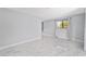 Bright, spacious living room featuring elegant marble floors and lots of natural light at 10197 Sw 88Th Ter, Ocala, FL 34481