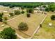 Aerial view showcasing the property's layout and expansive acreage at 10631 W Highway 40, Ocala, FL 34482