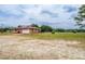 Scenic shot of the home highlighting its location and generous outdoor space at 10631 W Highway 40, Ocala, FL 34482