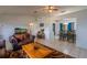 Open-concept living area flowing into dining space, perfect for entertaining at 10631 W Highway 40, Ocala, FL 34482