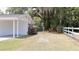 View of the backyard with white fenced property line at 1335 Ne 10Th St, Ocala, FL 34470