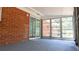 Enclosed back porch with sliding glass door access to the main house at 1335 Ne 10Th St, Ocala, FL 34470