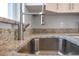 A close up view of the kitchen sink, featuring a granite countertop at 13493 Sw 112 Pl, Dunnellon, FL 34432