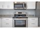 Well-equipped kitchen featuring stainless steel appliances and a functional design at 13493 Sw 112 Pl, Dunnellon, FL 34432