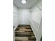 Walk-in closet with wire shelving and wood-look flooring; organized storage space at 3 Pine Radial Ln, Ocala, FL 34472