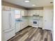 Well-equipped kitchen with modern appliances and plenty of cabinet space at 3 Pine Radial Ln, Ocala, FL 34472