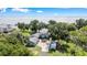 Stunning aerial view of a lakeside home with lush greenery, offering breathtaking views of the tranquil water at 4237 Chambers St, Lake Wales, FL 33898