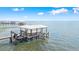 Aerial view featuring a dock with jet skis in the water of the property at 4237 Chambers St, Lake Wales, FL 33898
