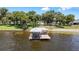 Aerial view of waterfront property with a dock at 4237 Chambers St, Lake Wales, FL 33898