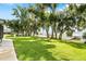 Beautiful backyard view featuring mature trees draped with Spanish moss and waterfront access at 4237 Chambers St, Lake Wales, FL 33898