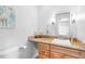 Bathroom featuring a vessel sink, granite countertops, and a decoratively painted heron at 4237 Chambers St, Lake Wales, FL 33898