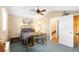 Bedroom with vaulted ceiling, ceiling fan, mirror and neutral walls at 4237 Chambers St, Lake Wales, FL 33898