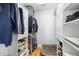 Walk-in closet with custom shelving and built-in storage for clothes, shoes, and accessories at 4237 Chambers St, Lake Wales, FL 33898