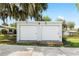 Detached garage with two doors, providing ample parking and storage space at 4237 Chambers St, Lake Wales, FL 33898