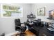 Office with large window and a black desk at 4237 Chambers St, Lake Wales, FL 33898