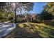 Charming home with well-manicured lawn and mature trees at 5425 Se 44Th Cir, Ocala, FL 34480