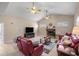 Cozy living room showcasing a fireplace and comfortable seating at 5425 Se 44Th Cir, Ocala, FL 34480