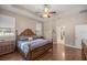 Bright main bedroom with trey ceiling, hardwood floors and ensuite bathroom at 5425 Se 44Th Cir, Ocala, FL 34480