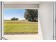 Beautiful view of the spacious backyard from the covered patio area at 5430 Nw 46Th Lane Rd, Ocala, FL 34482