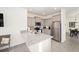 Modern kitchen features stainless steel appliances, granite counters, and ample cabinet space at 5430 Nw 46Th Lane Rd, Ocala, FL 34482