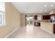 This open kitchen features stainless steel appliances and a sliding door to the yard at 5616 Nw 39Th Ln, Ocala, FL 34482