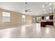 Spacious living room with tile flooring, abundant natural light, and an open layout at 5616 Nw 39Th Ln, Ocala, FL 34482