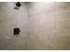 The walk-in shower features gray tiling and black hardware at 60 Walnut Dr, Ocala, FL 34480