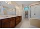 Spacious Primary bathroom with dual sinks and a glass-enclosed shower at 6376 Sw 97Th Terrace Rd, Ocala, FL 34481