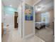 Bathroom and bedroom view with coordinated blue accents and a comfortable, inviting feel at 6376 Sw 97Th Terrace Rd, Ocala, FL 34481