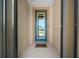 Inviting home entrance featuring a glass front door and a 'Home Sweet Home' welcome mat at 6376 Sw 97Th Terrace Rd, Ocala, FL 34481