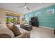 Cozy living room featuring recessed lighting, neutral paint, and a ceiling fan at 6376 Sw 97Th Terrace Rd, Ocala, FL 34481